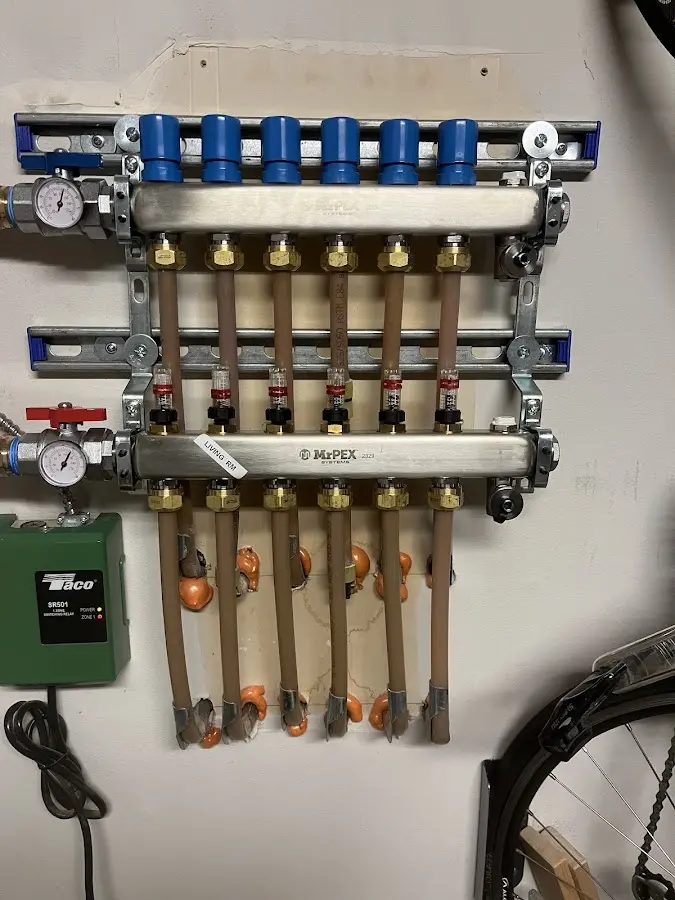 Plumber performing Water Heater Repair at a residential property in Conneaut