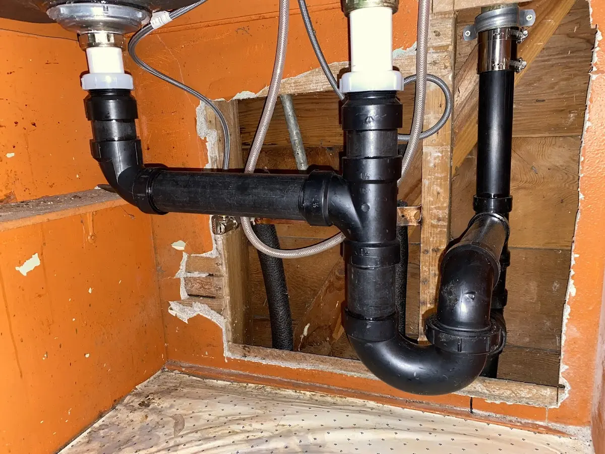 Professional Garbage Disposal Repair equipment and tools on the job in Conneaut